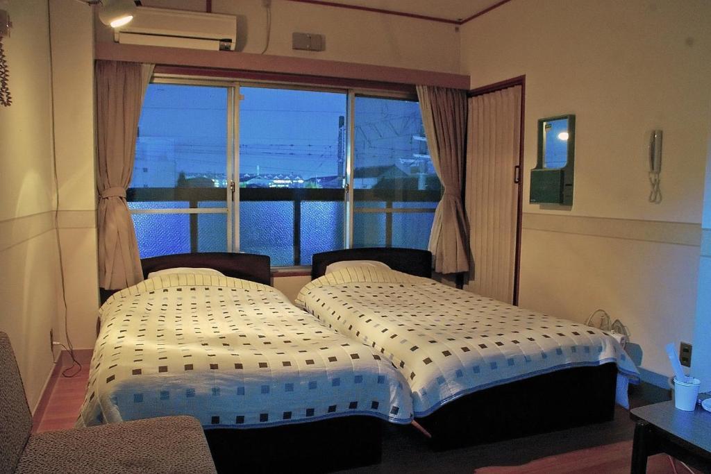 Hotel Yamabe Tenri Pokoj fotografie